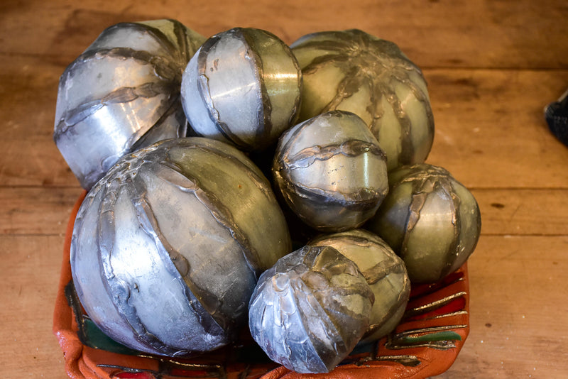 Collection of vintage decorative balls in zinc