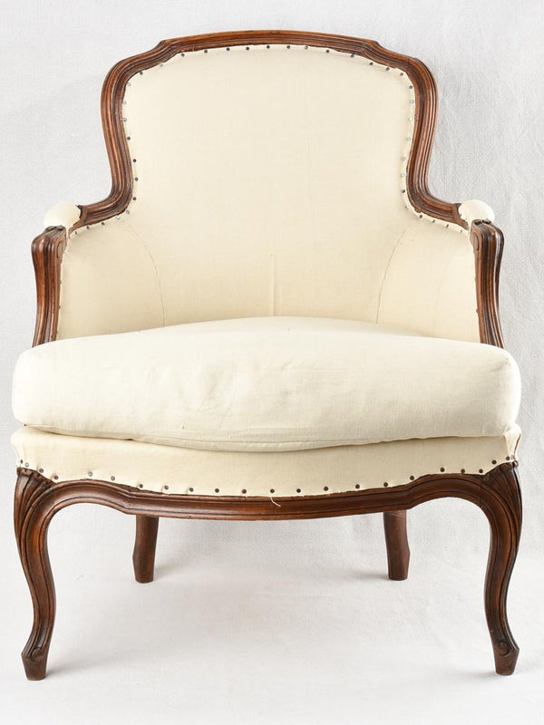 Louis XV style armchair with beige upholstery