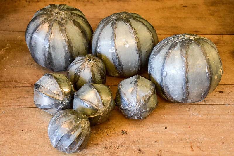Collection of vintage decorative balls in zinc
