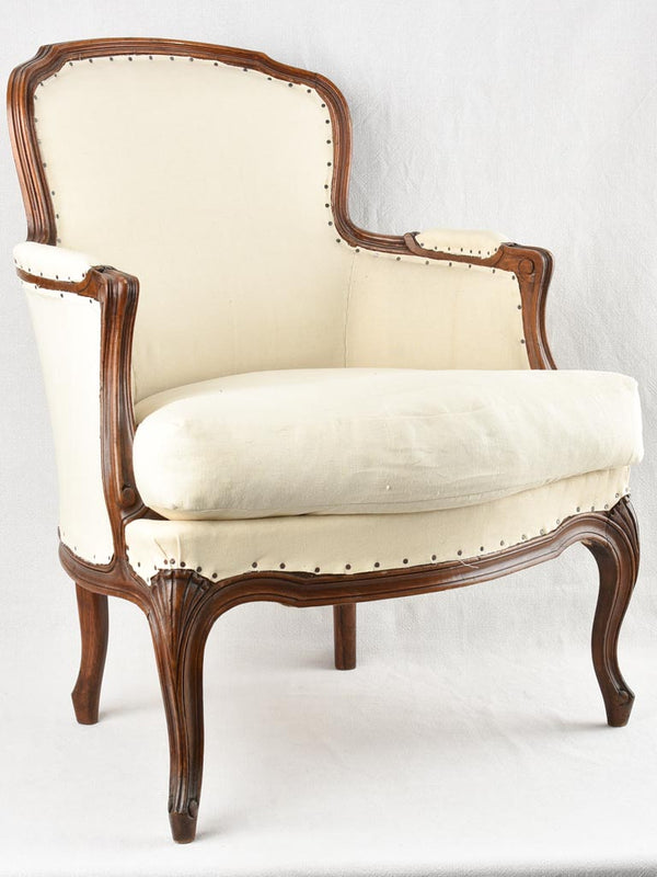 Louis XV style armchair with beige upholstery
