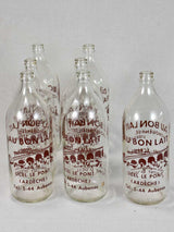 Collection of seven 1950's French milk bottles