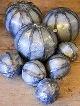 Collection of vintage decorative balls in zinc