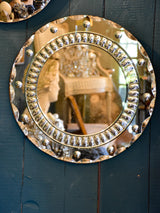 Round vintage French mirror with decorative frame