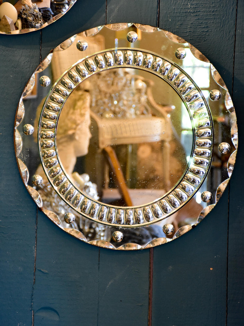 Round vintage French mirror with decorative frame