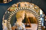 Round vintage French mirror with decorative frame