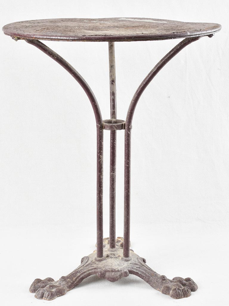 Burgundy / violet bistro table with claw feet