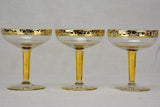 Six French champagne cups with gold decoration