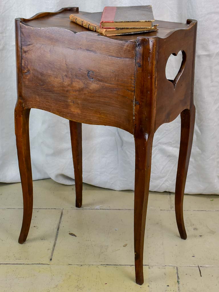 Antique French walnut nightstand with hearts