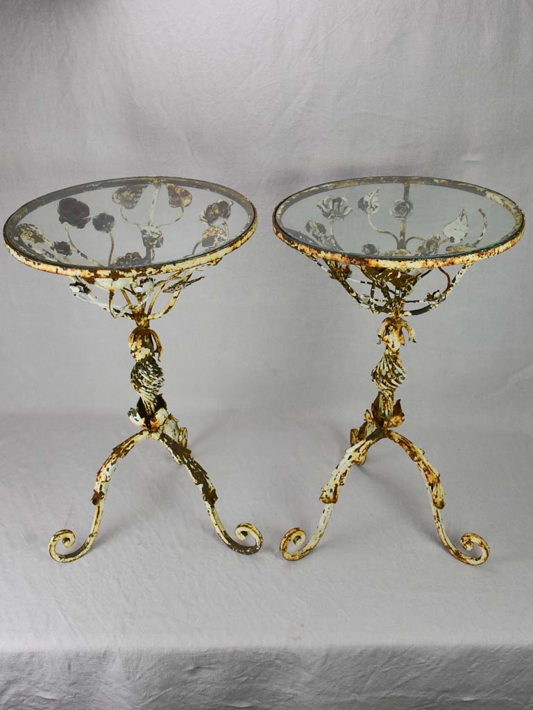 Pair of pretty weathered side tables with floral decoration and glass top