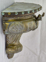 Antique French floating metal console with cherub