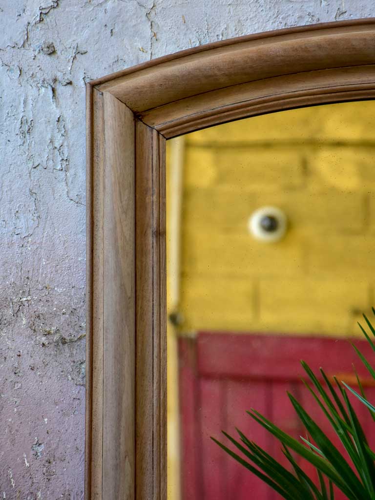 Large antique arched French mirror with walnut frame 31 ½" x 48 ½"