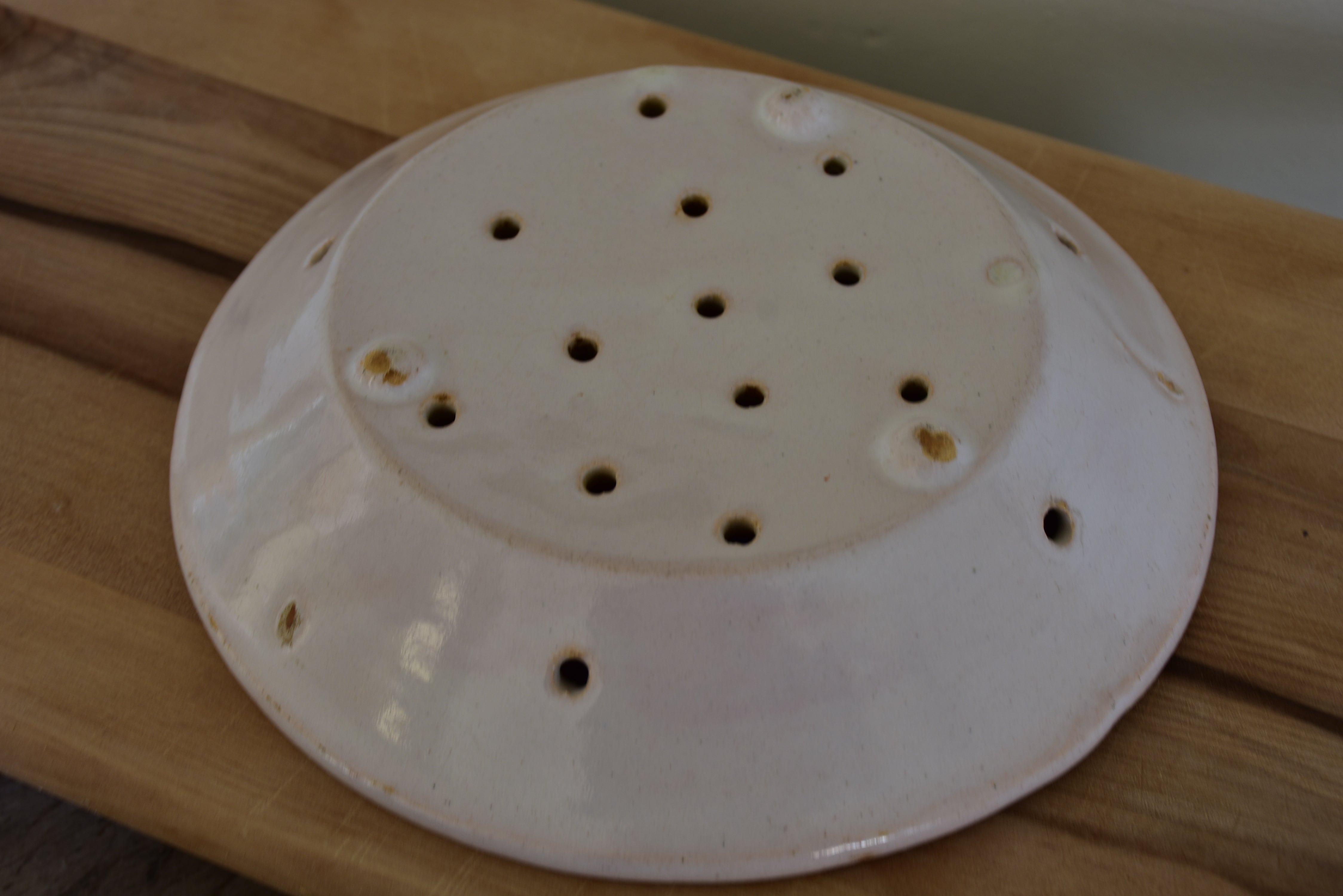French cheese mould or faisselle - French dish with drainage holes