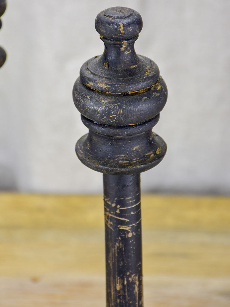 Two hat stands with black patina