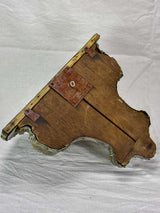 Antique French floating metal console with cherub