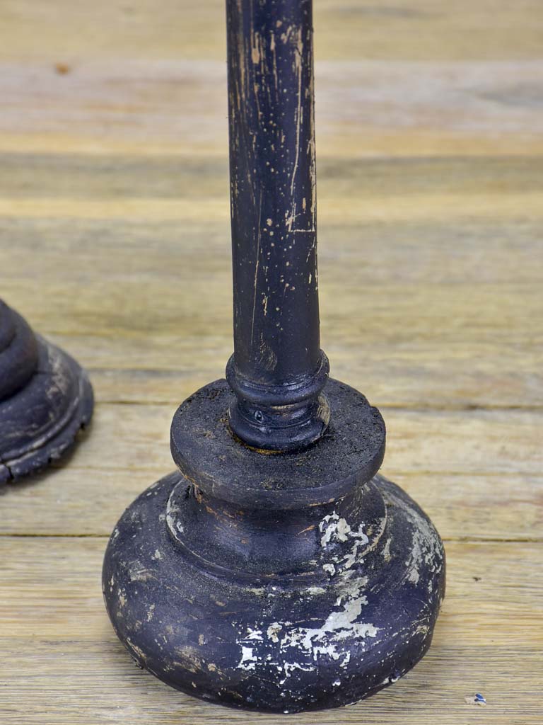 Two hat stands with black patina