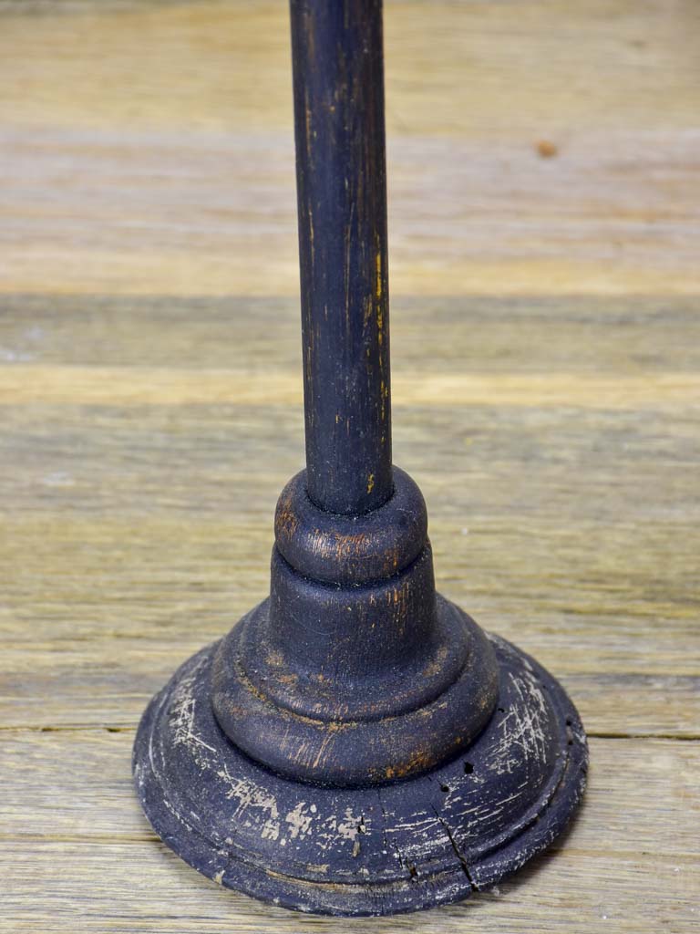 Two hat stands with black patina