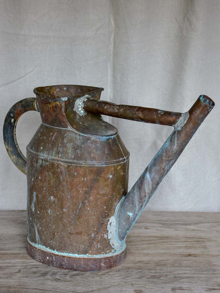 Antique French copper watering can with brace