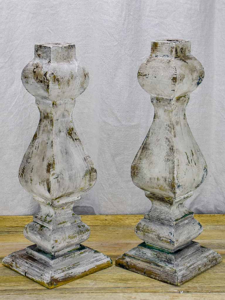 Pair of salvaged wooden decorative elements / candlesticks with grey patina