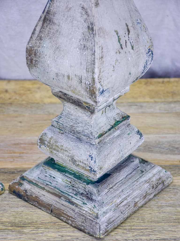 Pair of salvaged wooden decorative elements / candlesticks with grey patina