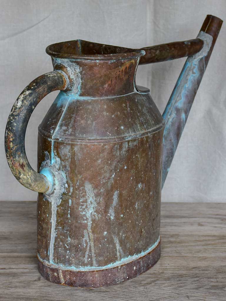 Antique French copper watering can with brace