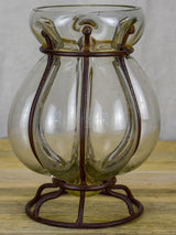 Blown glass vase in metal frame