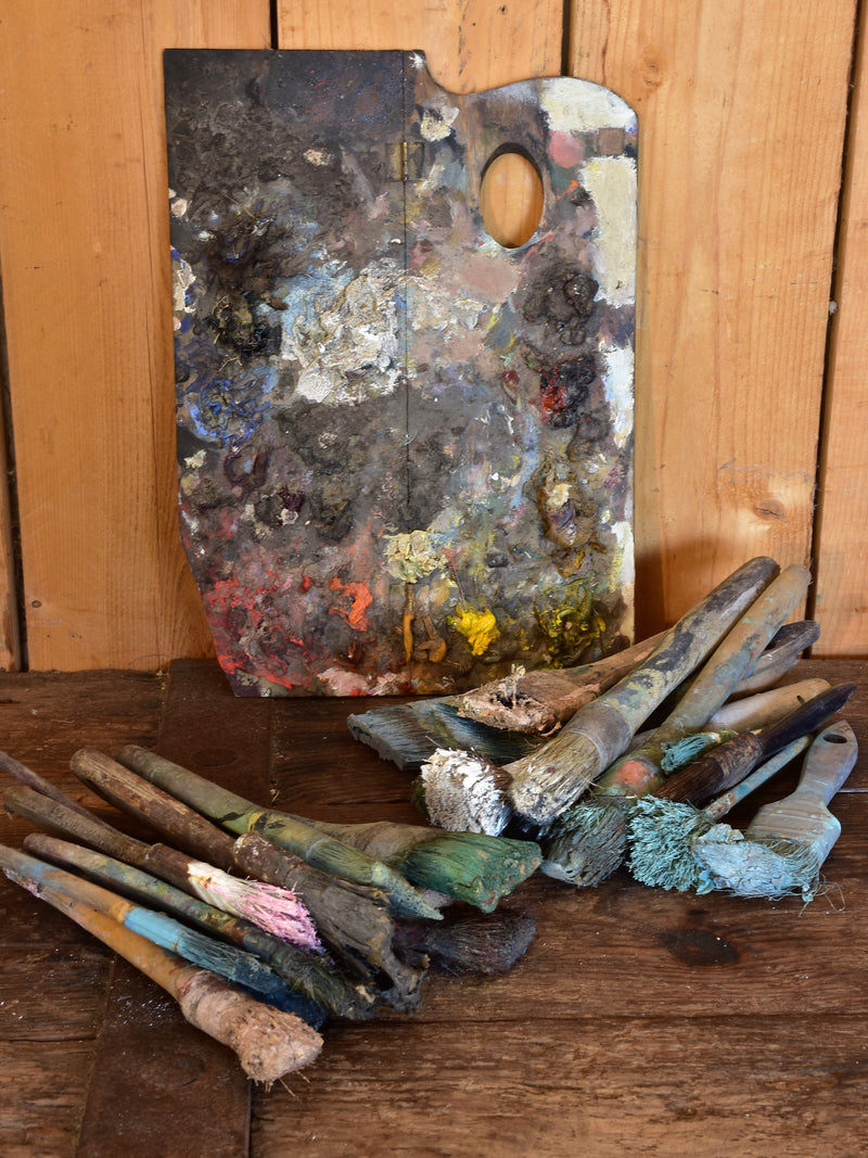 Rustic paint brushes and artist's palette