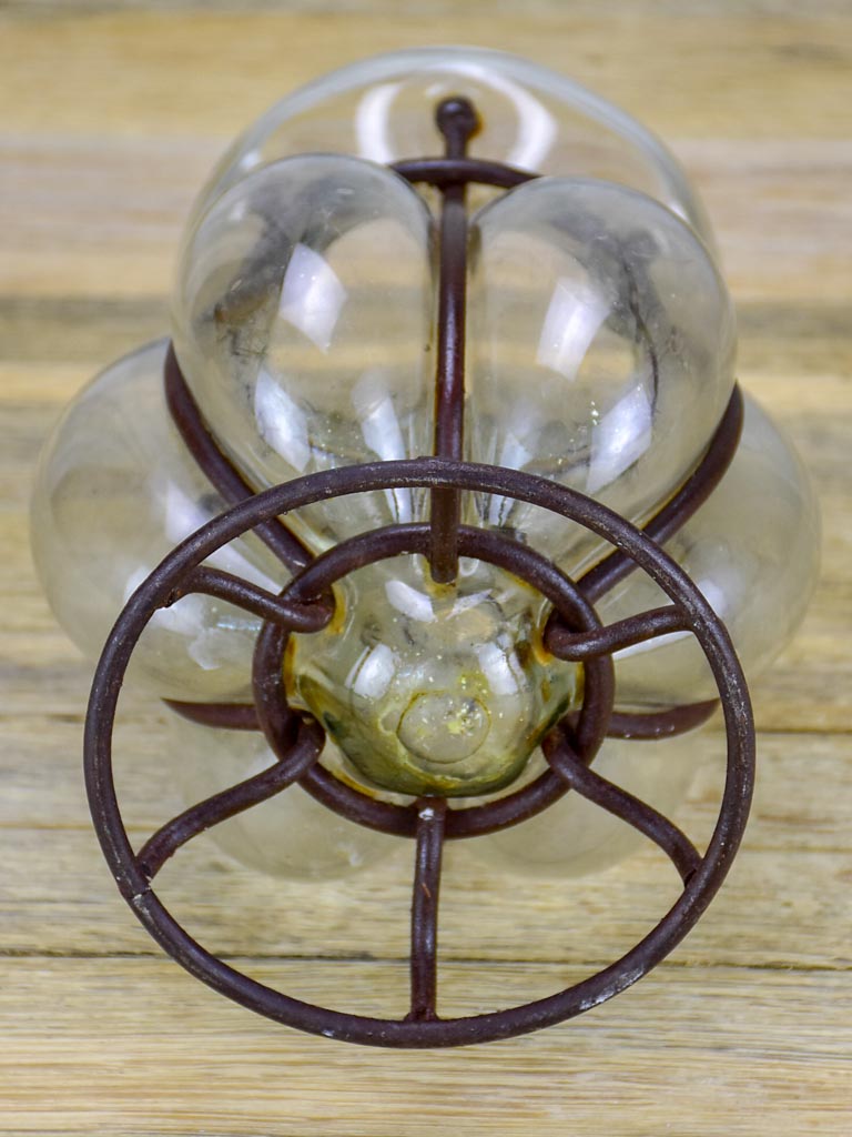 Blown glass vase in metal frame