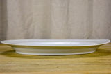 Pair of antique French oval platters with basin for jus