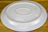 Pair of antique French oval platters with basin for jus