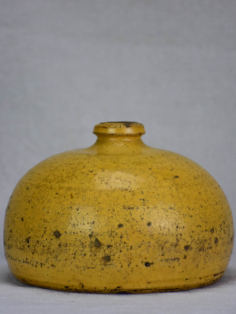 19th Century French ceramic hot water bottle with yellow glaze 7"
