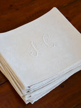 Set of 11 vintage French linen serviettes with JC monogram