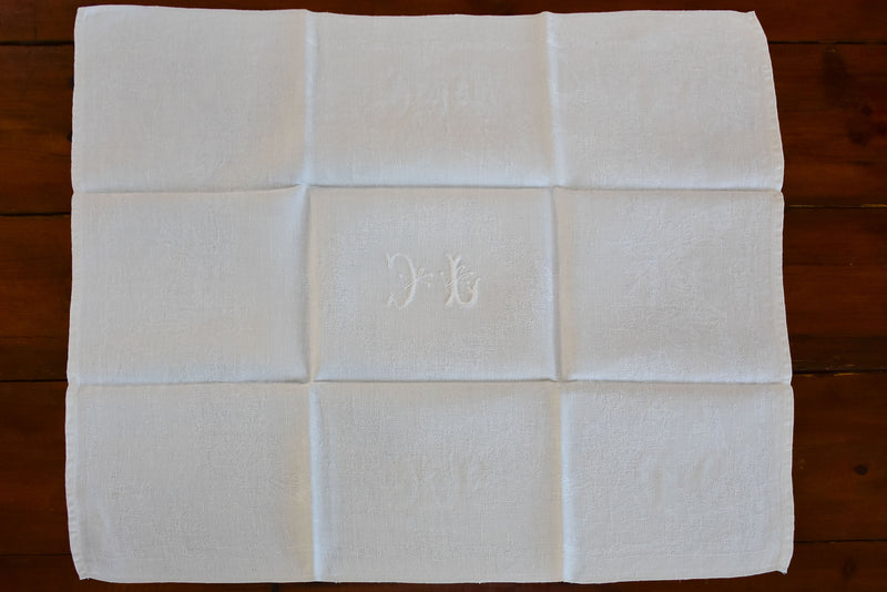 Set of 11 vintage French linen serviettes with JC monogram