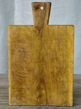 Small antique French cutting board with repairs