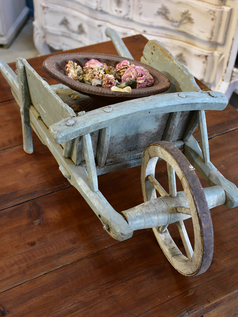 Small French wooden wheelbarrow