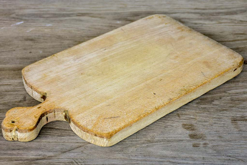 Vintage French cutting board with light colored timber
