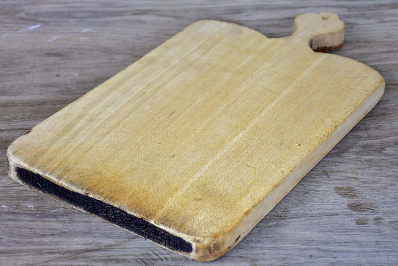 Vintage French cutting board with light colored timber