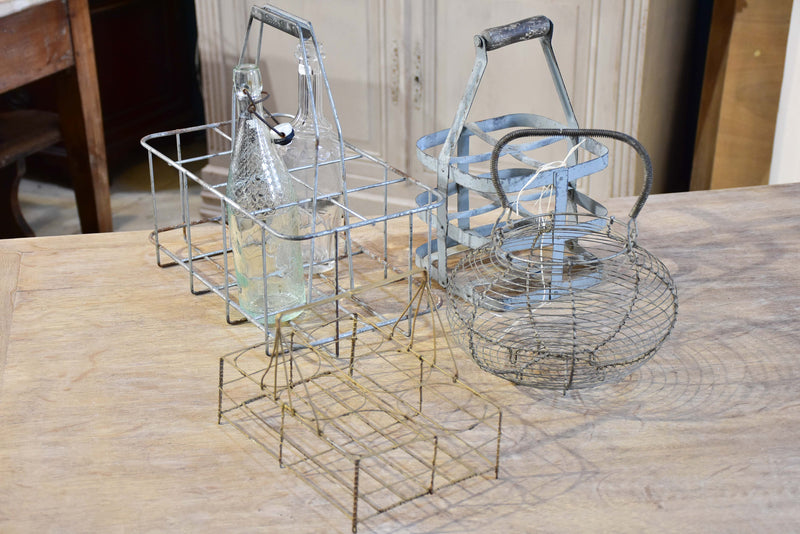 Collection of antique and vintage wire baskets and bottle carriers