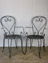 Pair of heart-back garden armchairs with black painted finish