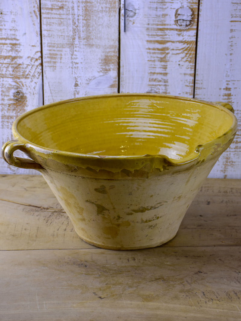 Antique French deep preserving bowl with yellow glaze