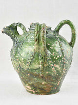 18th century walnut oil jar with green patina 12½"