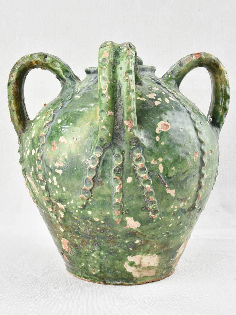 18th century walnut oil jar with green patina 12½"