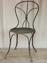 Antique French garden chair with branch - like back