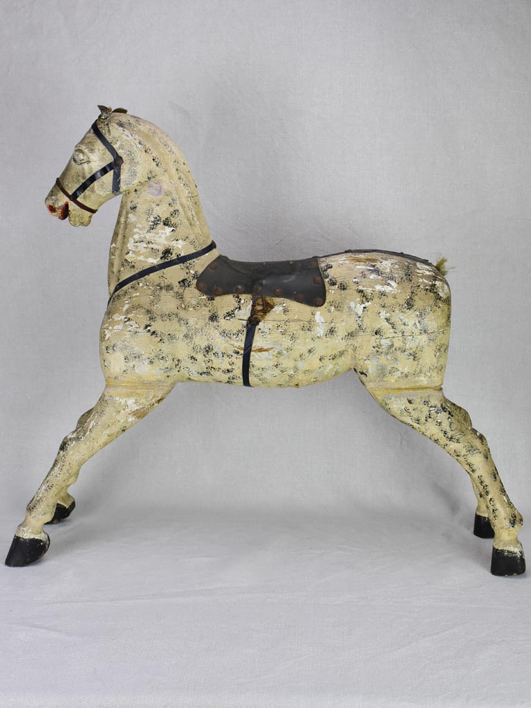 Late 19th Century French toy horse with leather saddle 24½"