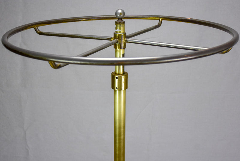 Antique French clothes rack display from a boutique - brass