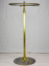 Antique French clothes rack display from a boutique - brass