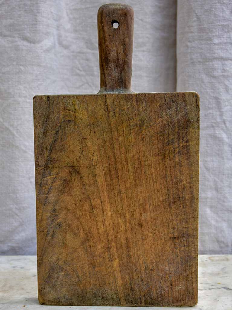 Small antique French cutting board with catchment gutter