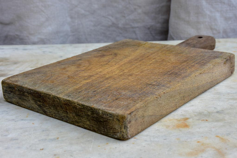 Small antique French cutting board with catchment gutter