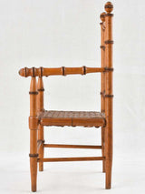 Aged bamboo-like wood doll's chair