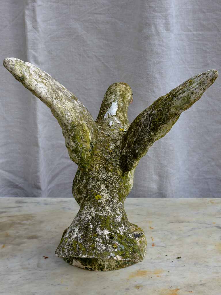 Early 20th century sculpture of a bird with outstreatched wings