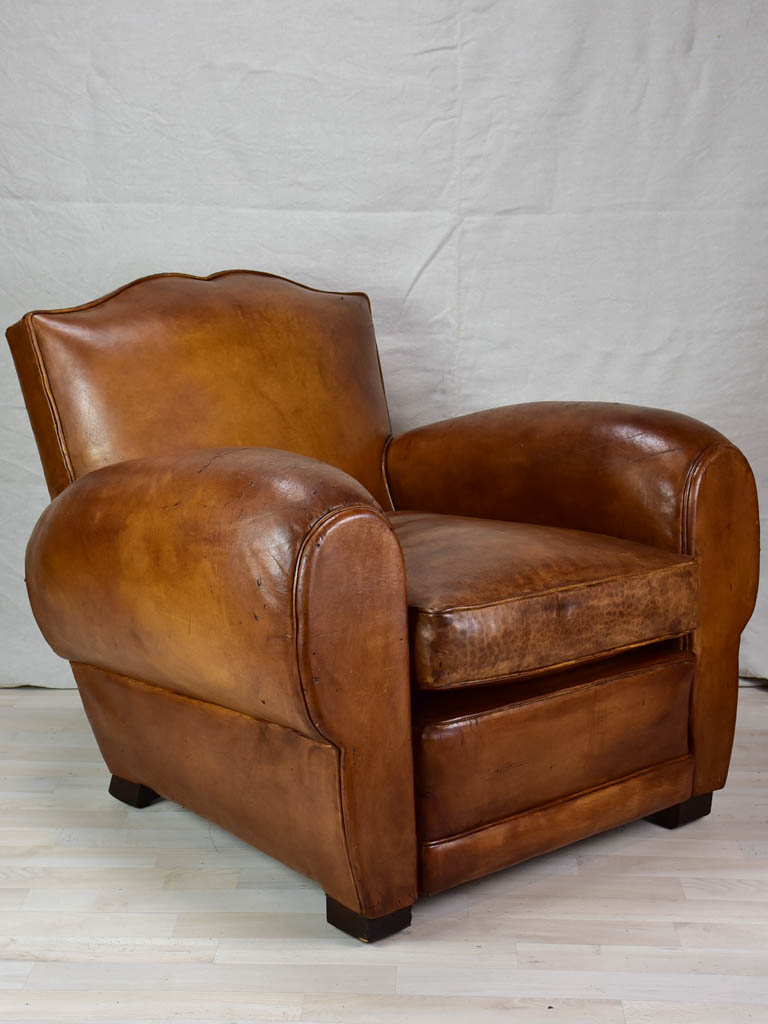 Large 1950's French leather club chair with mustache back and barrel arms